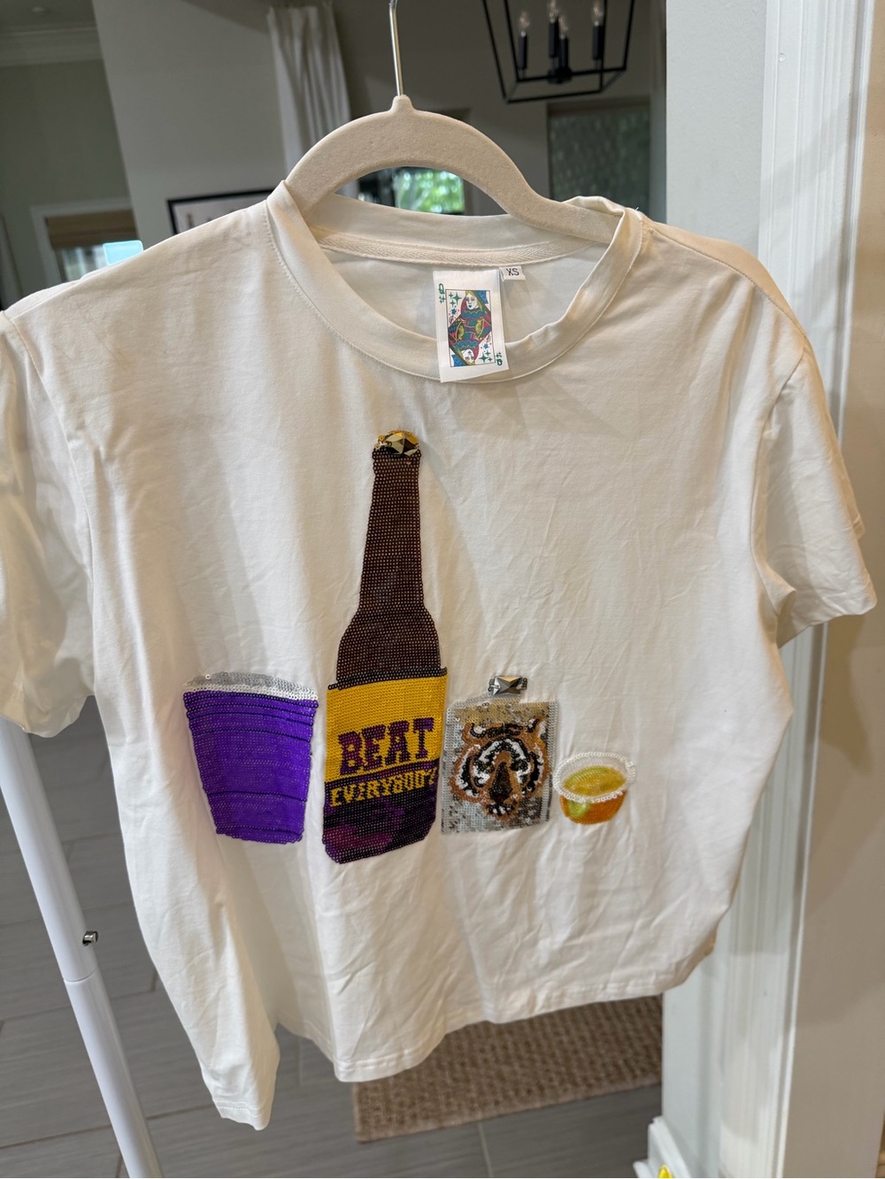 QUEEN OF SPARKLES Beverage Graphic Tee in White with Purple & Yellow Accents